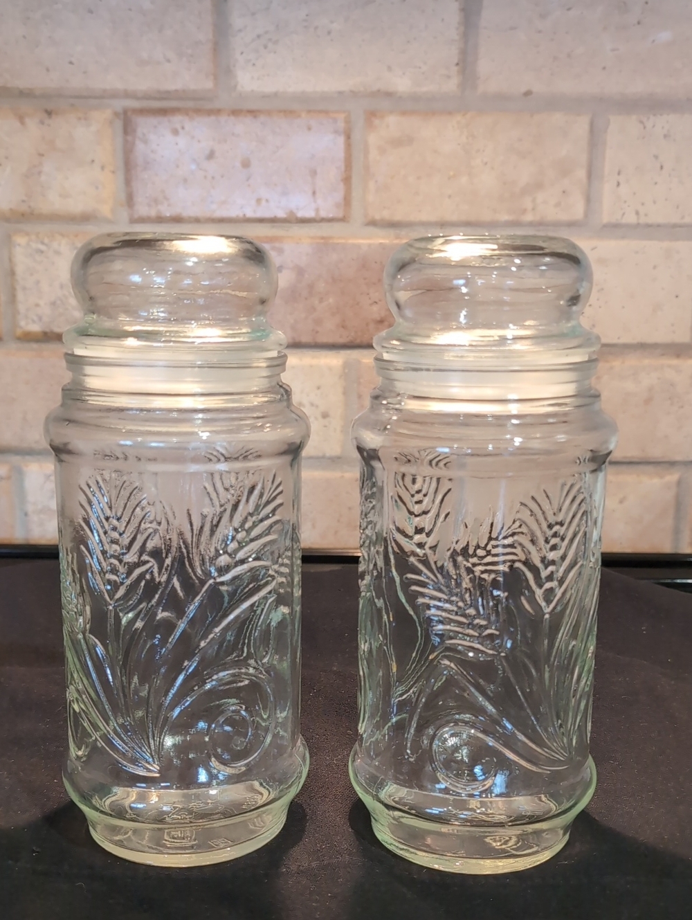 Two (2) 1982 Mr. Peanut Storage Glass Jars With Lids Wheat Stalk Design 8.5"